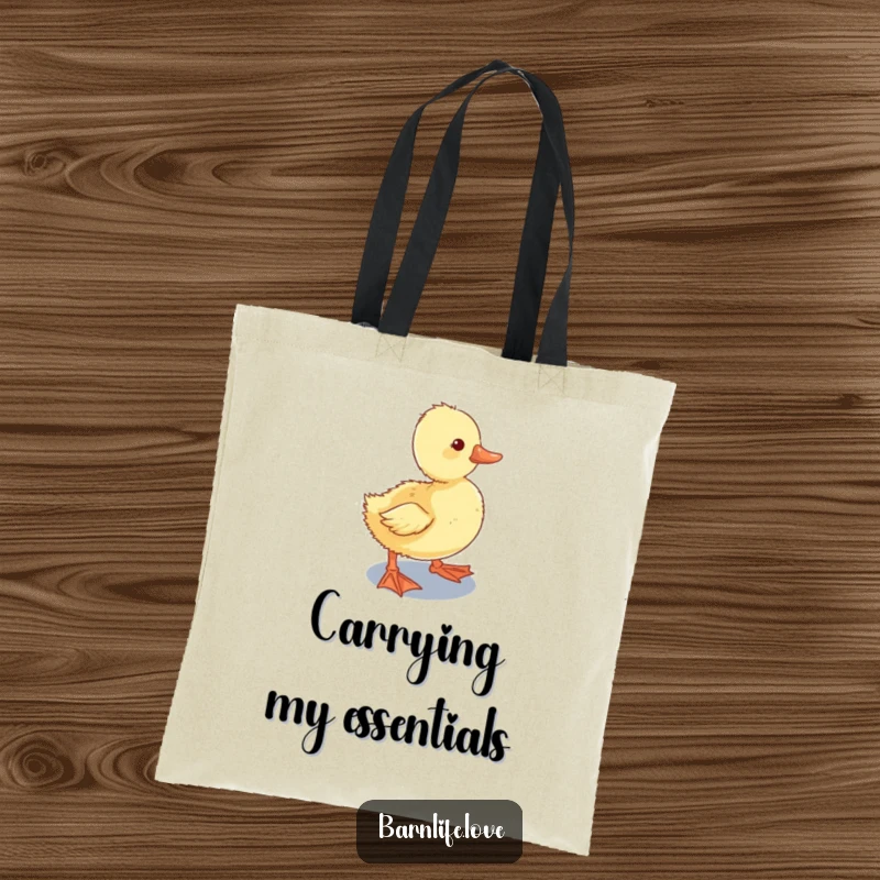 Funny Tote Bag with a curious duckling waddling towards a shiny water trough, a charming and practical farm-themed accessory.