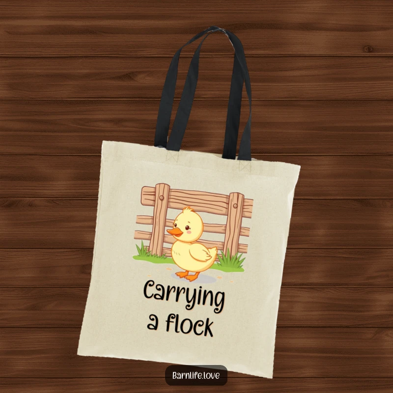 Funny duckling tote bag showing a happy baby duck waddling near a wooden farm fence, ideal for carrying daily necessities with charm.